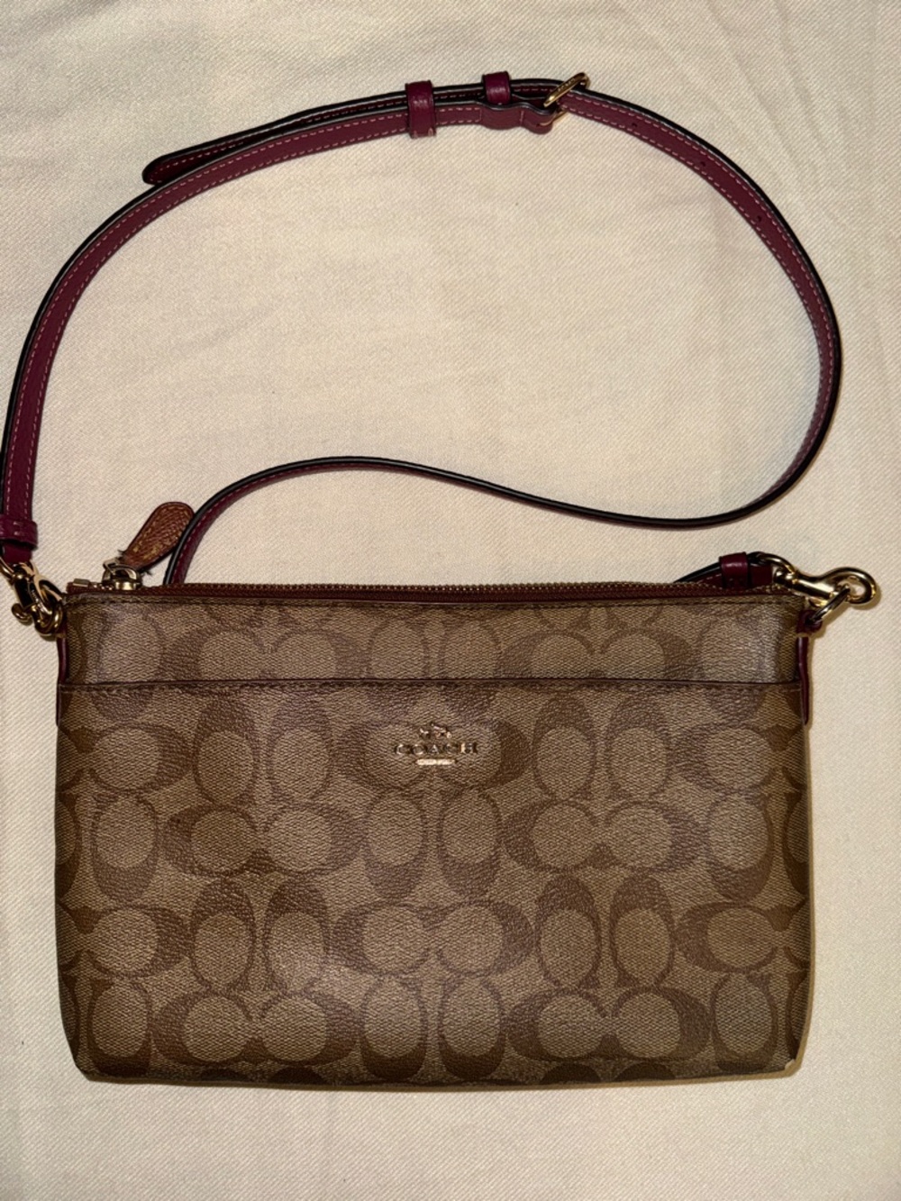 Coach Brown Signature Coated Canvas Crossbody with Berry Strap Accent